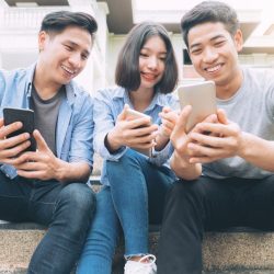teens-using-mobile-phone-for-social-media.jpg